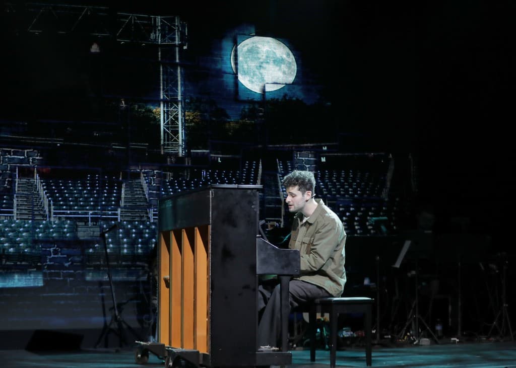 Ethan Riordan as Jonathan Larson at the piano — tick, tick… BOOM! Pittsburgh CLO